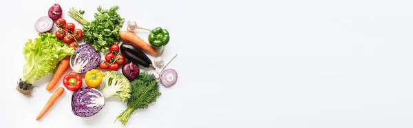 Top view of colorful assorted fresh vegetables on white background, panoramic shot — Stock Photo