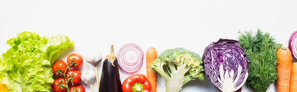 Top view of colorful assorted fresh vegetables on white background, panoramic shot — Stock Photo