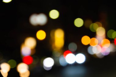 Renkli daire bokeh koyu arka plan üzerinde gömerim