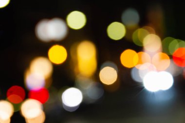 Renkli daire bokeh koyu arka plan üzerinde gömerim