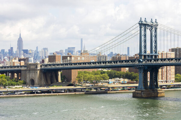 New York City. The Manhattan Bridge, a suspension bridge that crosses the East River connecting Lower Manhattan with Downtown Brooklyn, seen from Brooklyn Bridge