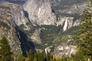 Views of Yosemite Valley from the Washburn Point observation area. A World Heritage Site since 1984 clipart