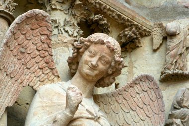 Reims, France. The Smiling Angel (l'Ange au Sourire), a famous sculpture of the Cathedral of Our Lady (Cathedrale Notre Dame) clipart