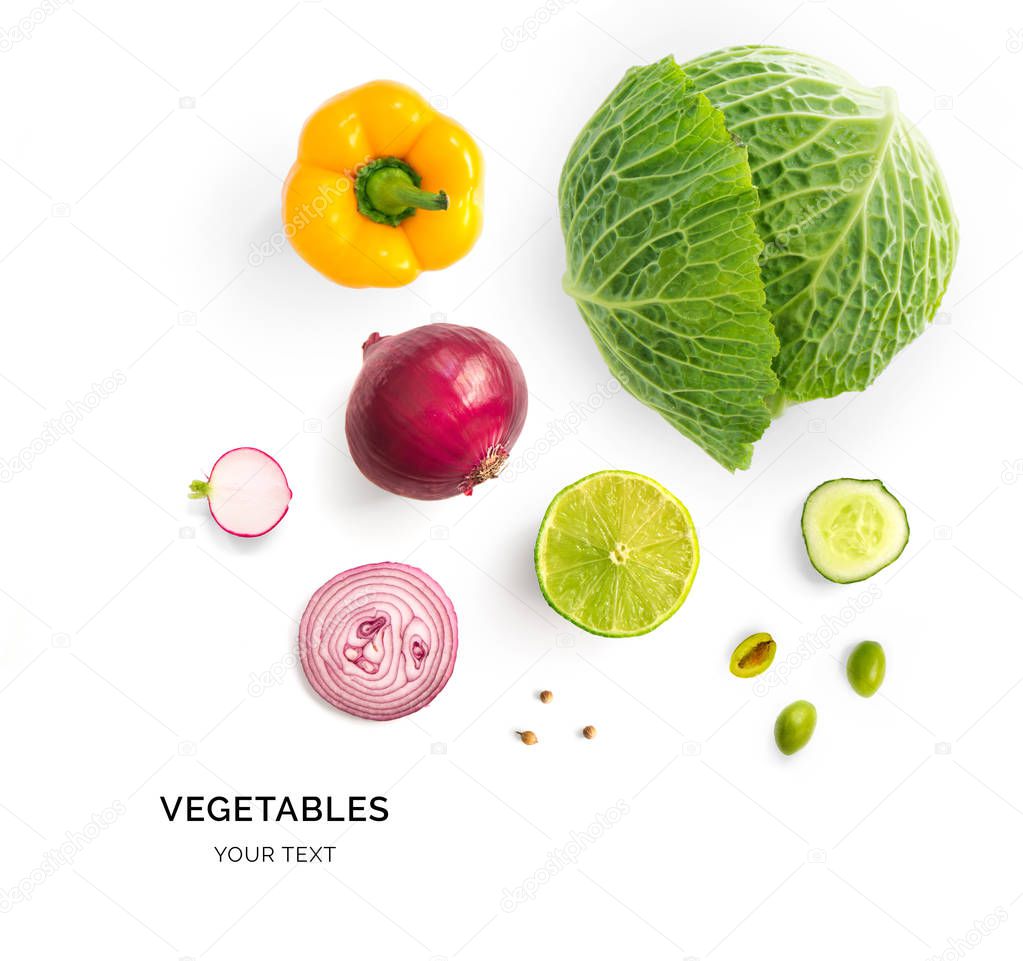 Creative layout made of green cabbage, onion, yellow pepper and lime on white background 