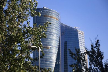 Four modern skyscrapers (Cuatro Torres) in business financial district of Madrid, Spain 2018-08-14