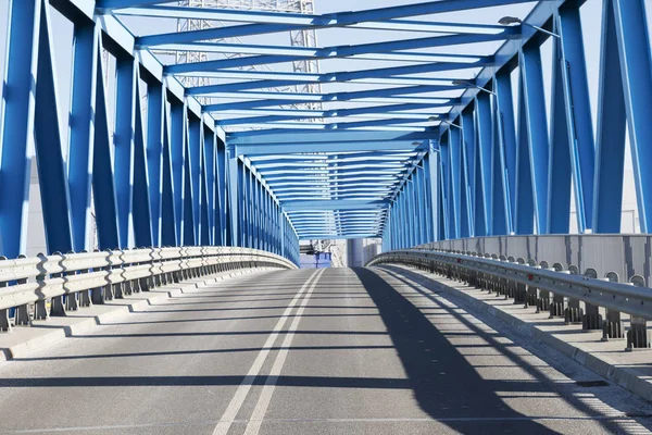 modern bridge construction and road going through the bridge