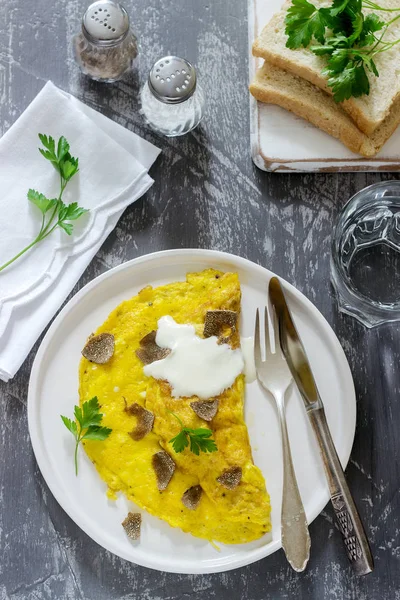 Omelette Truffle Parsley Served Sour Cream Bread Glass Fresh Water — Stock Photo, Image