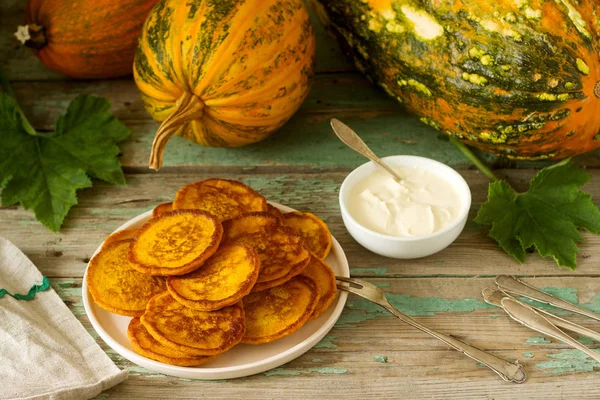 Homemade Pumpkin Pancakes Sour Cream Ripe Pumpkin Pumpkin Leaves Selective — Stock Photo, Image