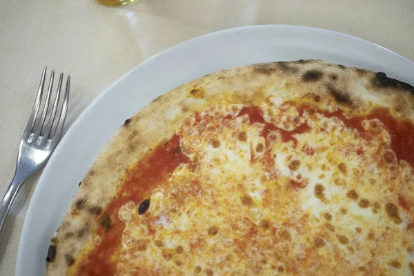 Pizza Margarita with tomato and mozzarella cheese