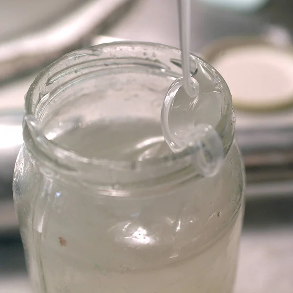Liquid sugar in glass pot