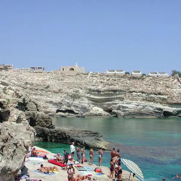 Lampedusa, Itálie-září 02, 2002: turisté v Lampedusu — Stock fotografie