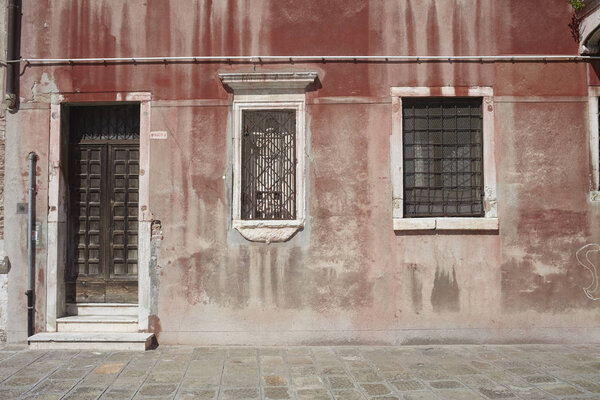 Venezia, Italy - September 08, 2015 : Door enrance of an ancient building in Venice