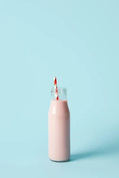 Closeup Image Strawberry Milkshake Bottle Drinking Straw Blue Background — Stock Photo, Image