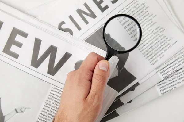 Partial Top View Person Holding Magnifying Glass Newspapers — Stock Photo, Image