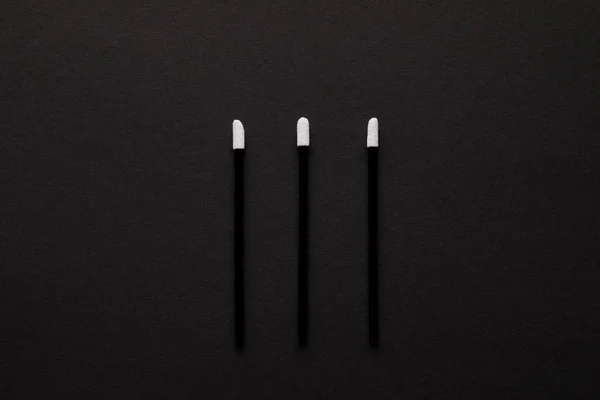 Top view of three brushes for permanent makeup isolated on black — Stock Image Top View Three Brushes Permanent Makeup Isolated Black Royalty Free Stock Images