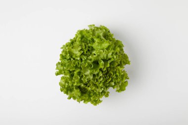 top view of bunch of lettuce on white surface clipart