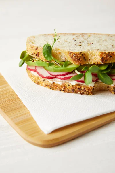 Close Shot Fresh Sandwich Radish Slices Avocado Pea Shoots Wooden — Stock Photo, Image