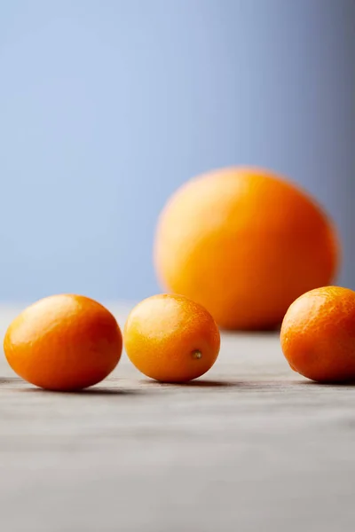 Close Shot Kumquats Orange Wooden Surface — Stock Photo, Image