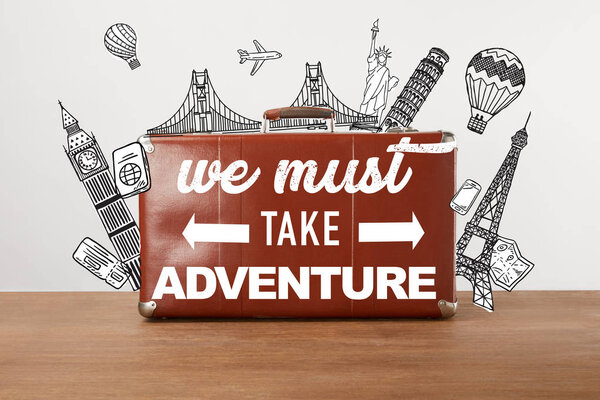 Vintage brown leather travel bag with illustration and inspiration - we must take adventure