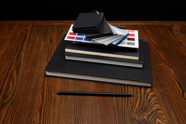 Close View Black Notebooks Colors Pallet Pencil Wooden Tabletop — Stock Photo, Image