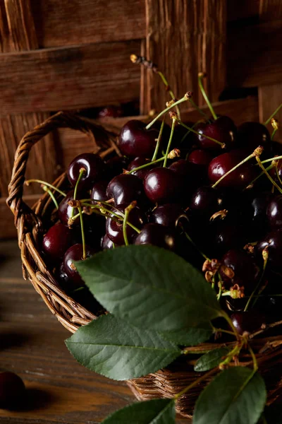 Close Shot Fresh Ripe Sweet Cherries Old Basket Wooden Surface — Free Stock Photo