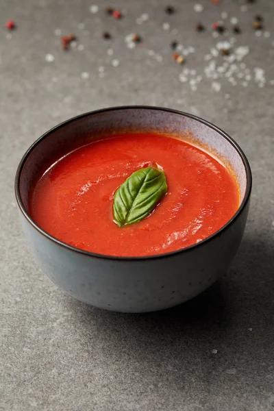 Plate of appetizing tomato soup on grey table — Stock Image Plate Appetizing Tomato Soup Grey Table Stock Photo