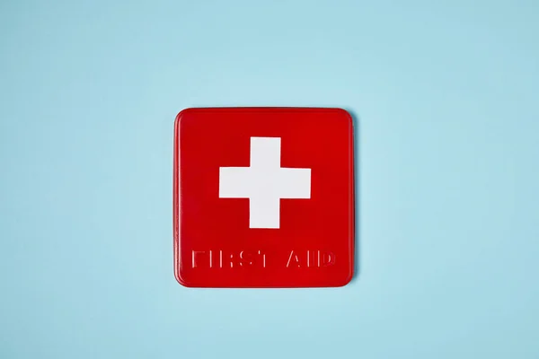 Top View Red First Aid Kit Box Blue Surface — Stock Photo, Image