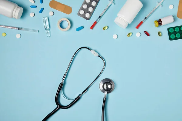 Top View Stethoscope Different Medicines Blue Surface — Stock Photo, Image