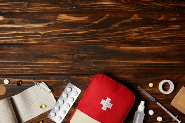 Top View First Aid Kit Different Medicines Wooden Tabletop — Stock Photo, Image