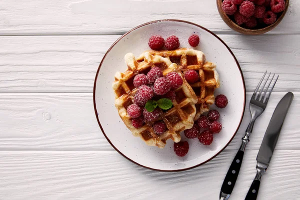 Freshly Baked Belgian Waffles Raspberries Plate Cutlery White Wooden Table — Stock Photo, Image
