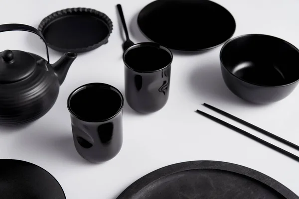 Selective Focus Black Teapot Plate Bowl Cups Chopsticks Tray White — Free Stock Photo