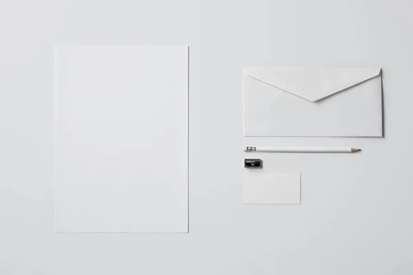 Bovenaanzicht Van Zakelijke Mockup Met Papier Potlood Wit Oppervlak Voor — Stockfoto