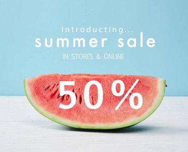 fresh watermelon slice with summer sale and 50 discount symbol