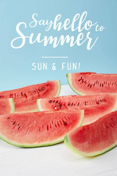 Red Watermelon Slices White Surface Blue Backdrop Say Hello Summer — Free Stock Photo