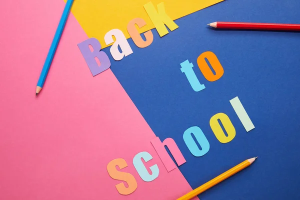 Colorful Back School Lettering Pencils Paper Background — Free Stock Photo