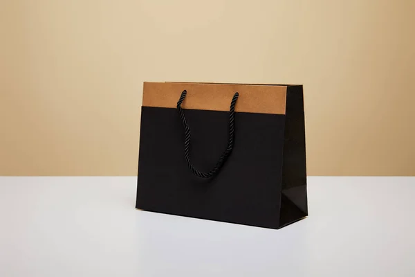 One Black Shopping Bag White Table — Stock Photo, Image