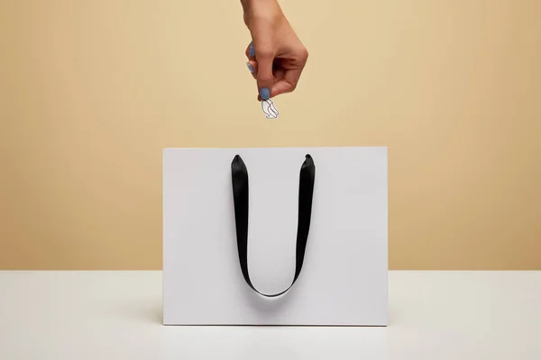 Cropped Image Woman Putting Paper High Heel Shopping Bag White — Free Stock Photo