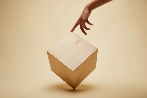 Cropped Image Woman Touching Wooden Cube Beige — Stock Photo, Image