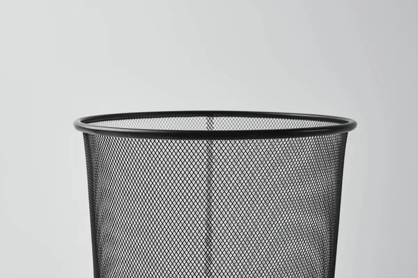 close-up shot of office trash can isolated on white