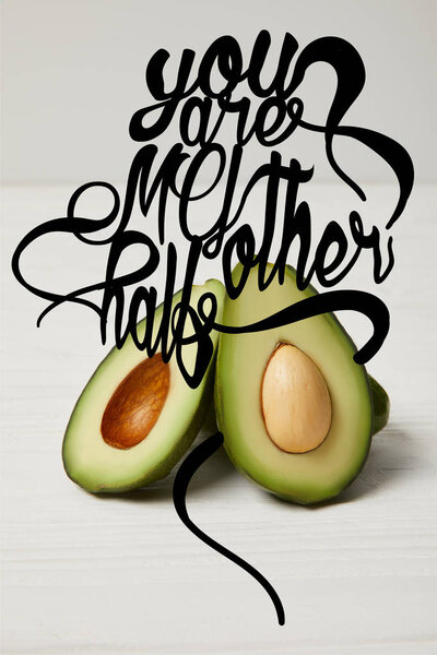 fresh green avocado, clean eating concept. "You are my other half" lettering