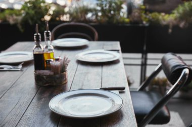 close-up shot of simple table setting with spices at restaurant clipart