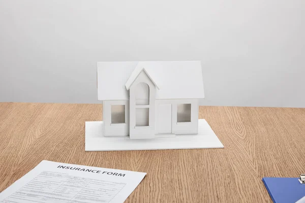 Close View Insurance Form Small House Model Wooden Table — Stock Photo, Image