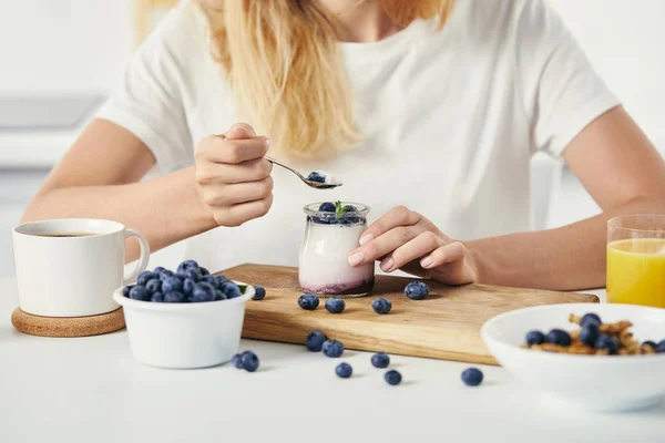 Cropped Shot Woman Tabletop Yogurt Blueberries Cup Coffee Glass Juice — Stock Photo, Image