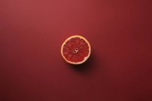 Top View Piece Grapefruit Red Surface — Free Stock Photo