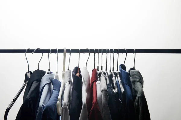 Row Different Shirts Hangers Isolated White — Stock Photo, Image