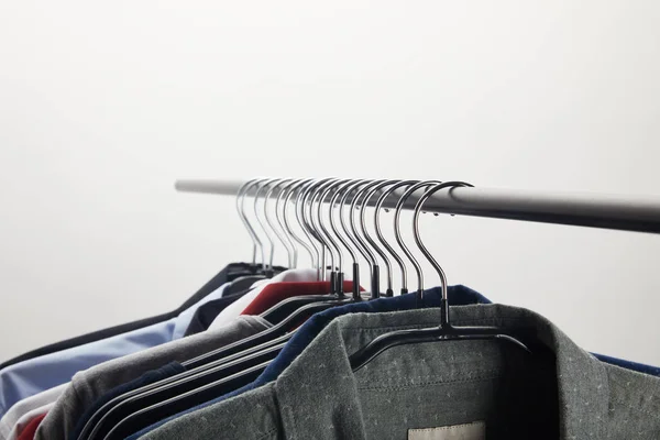 Selective Focus Different Shirts Hangers Isolated White — Stock Photo, Image