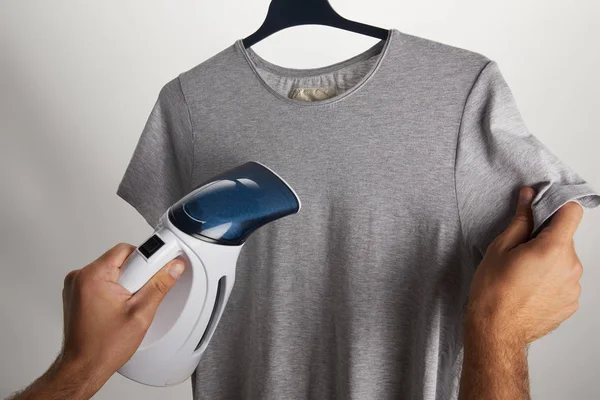 Cropped Image Man Ironing Grey Shirt Hanger Isolated White — Stock Photo, Image