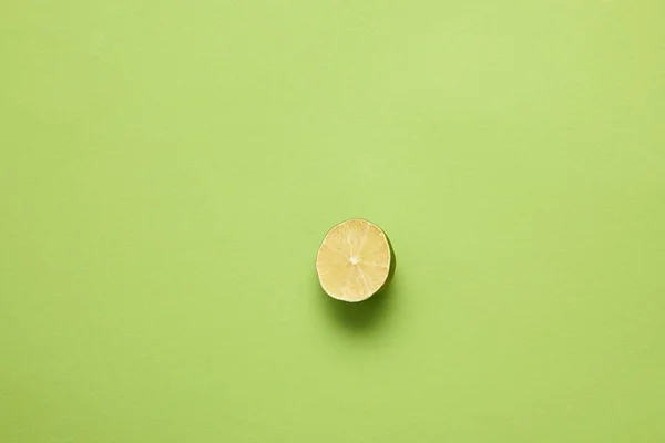 Top View Halved Ripe Lime Light Green Background — Stock Photo, Image