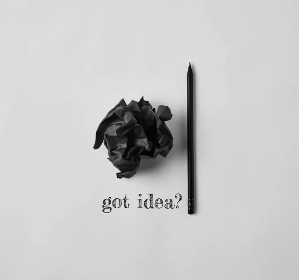 Top View Black Crumpled Paper Pencil Got Idea Lettering White — Stock Photo, Image