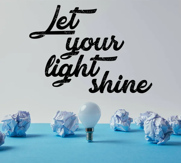 Light Bulb Crumpled Papers Blue Surface Let Your Light Shine — Stock Photo, Image